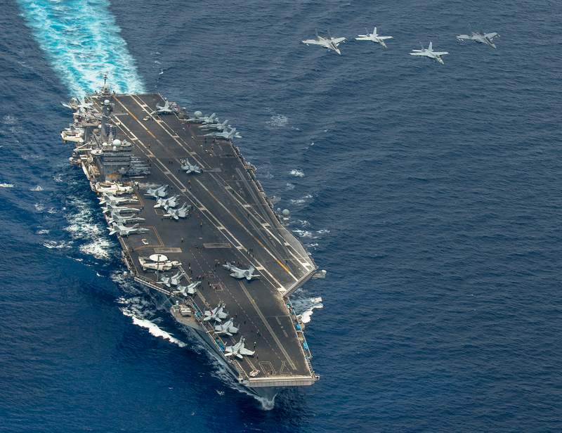 Illustration for article titled Navy Hornets Mock-Dogfight With Malaysian Flankers In South China Sea
